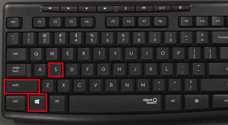 Press the Windows and Shift keys together, followed by the S key.